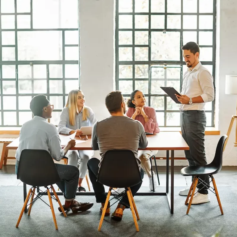 young-business-people-meeting-office-teamwork-grou-2023-11-27-05-29-42-utc